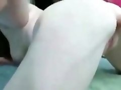 Amateur redhead masturbates and squirts on dildo machine