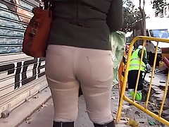 Following Nice Big Butt In Tight Beige Trousers