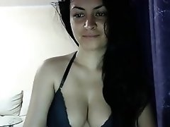Hot brunette shows her tits while eating ice cream on live