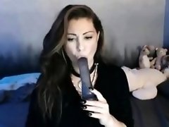Emo Girl puts dildo in her mouth and takes